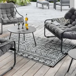 Tapis d'extérieur en polypropylène recyclé noir et crème Ethnique